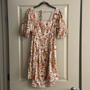 New, tags were removed, floral dress.